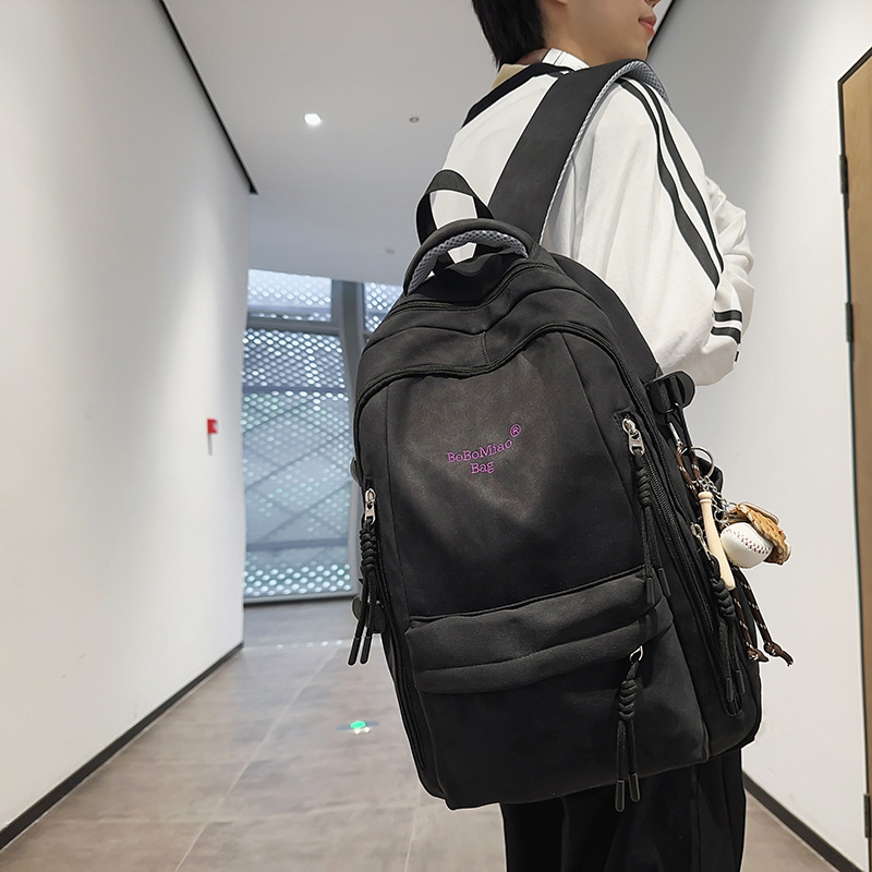 Large-capacity dark-patterned gradient color schoolbag for junior high school girls, high school and college students, light travel backpack for boys details Picture