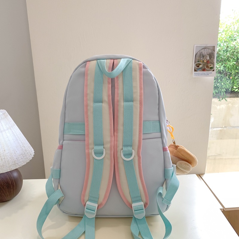A cute two-piece backpack set of forest style for middle school students from grades three to six with a Japanese and Korean ins school style color contrast Specification drawing