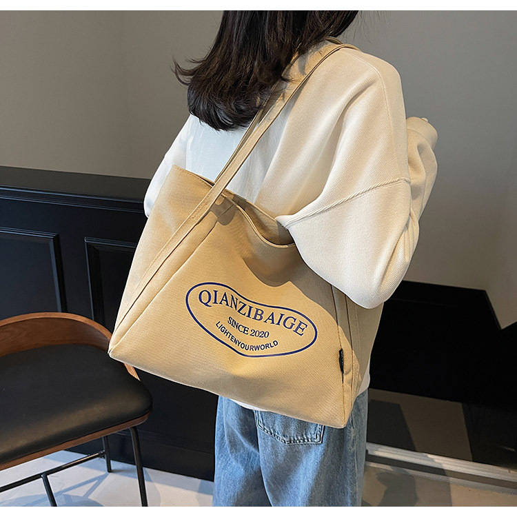 2020 New Korean-style niche retro laid-back tote bag, large-capacity single-shoulder crossbody bag, office commuting underarm bag full figure
