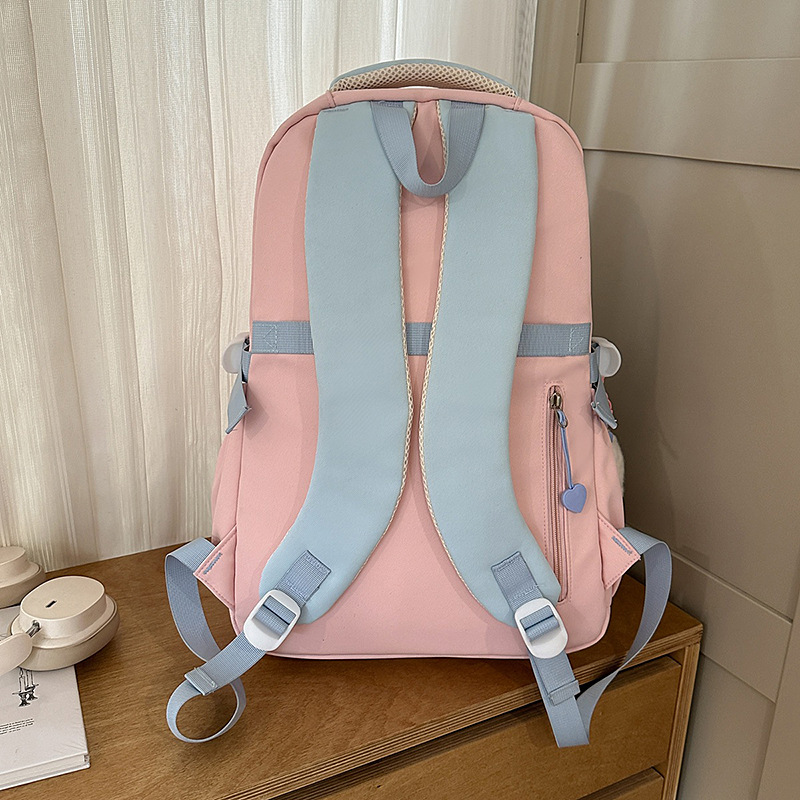 A new Japanese-style ins backpack with a high level of appearance, fresh and sweet, featuring a color-blocking and color-blocking design. It is a lightweight backpack for junior and senior high school students Specification drawing