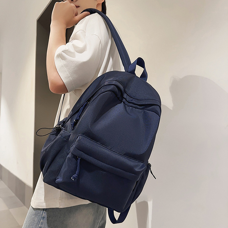 A new high-look, solid-color, simple backpack from the Korean version of Instagram. It's a casual, lightweight, versatile and large-capacity backpack for couples details Picture