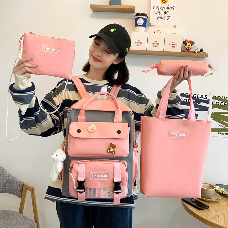Korean version of ins school junior and senior high school schoolbag fashion four-piece set, primary school schoolbag, school junior and senior high school backpack Application Scenario