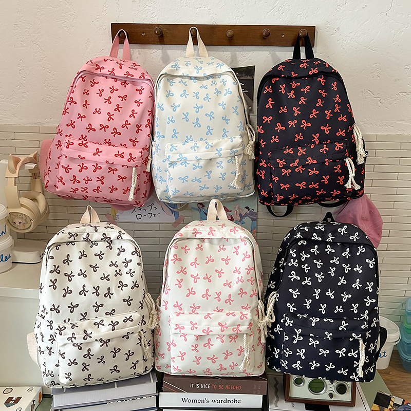 Large-capacity, high-appearance-level backpack with a bow for junior high school, 2025 new style ins fresh college backpack and schoolbag details Picture