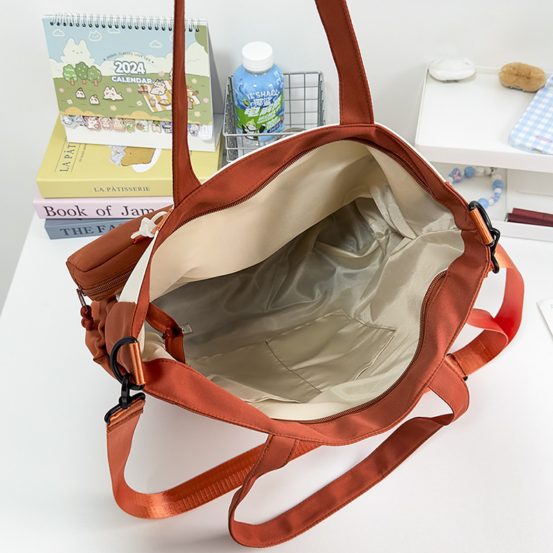 Japanese-style InS-style schoolgirl tutorial bag, fresh and simple single-shoulder crossbody bag, large-capacity student class tote bag Application Scenario