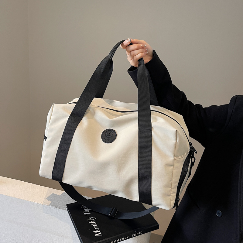 Travel bag, women's short-distance large-capacity luggage bag, fitness bag, men's fashionable handbag, casual commuting, crossbody storage Specification drawing
