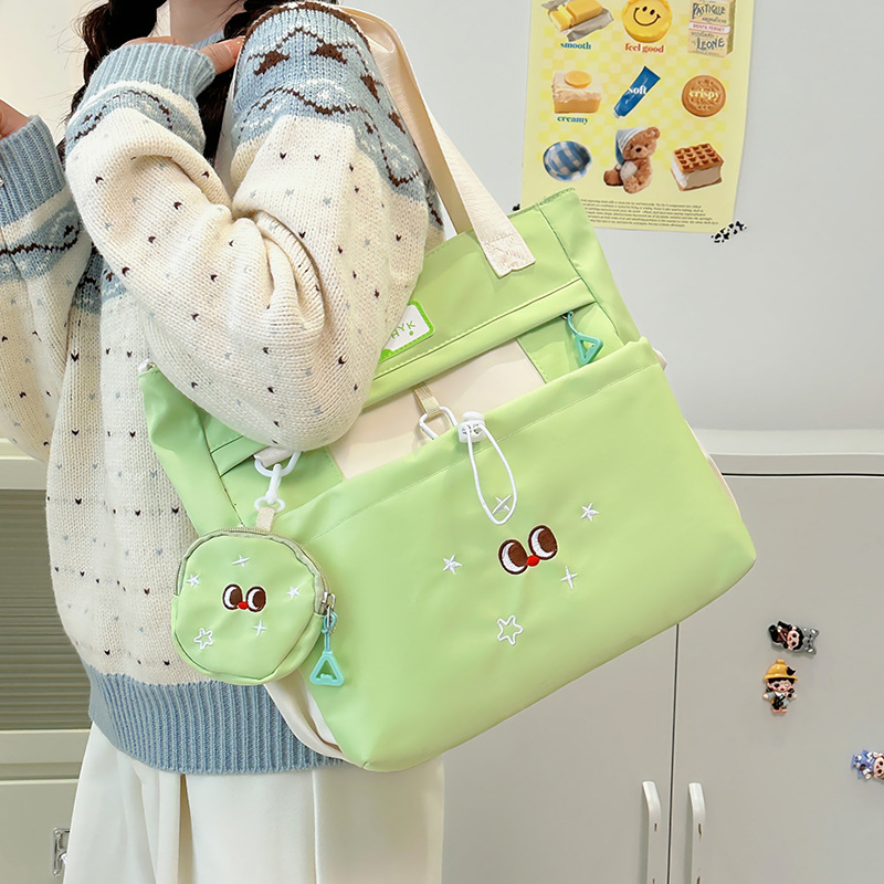 2025 New Korean version large-capacity student commuting and make-up class bag, simple and casual college style handbag, versatile backpack full figure