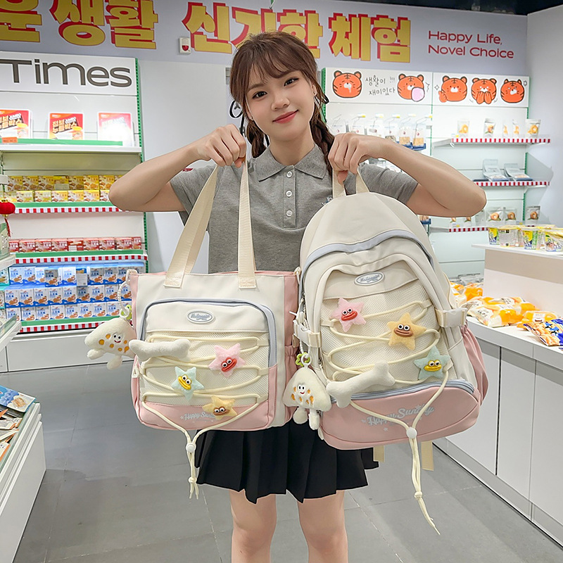 The new high-appearance-level college style backpack for junior and senior high school students is fresh, cute, casual, simple and has a large capacity details Picture