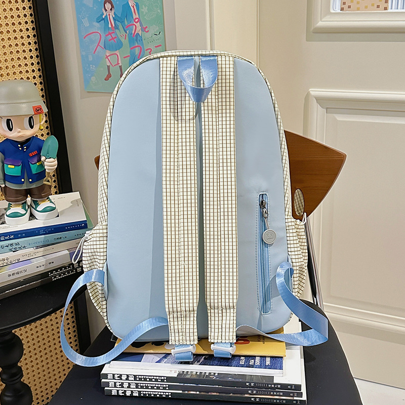 A new large-capacity multi-compartment versatile backpack for junior and senior high school students, featuring a forest-themed college style, is fresh, sweet and casual Specification drawing