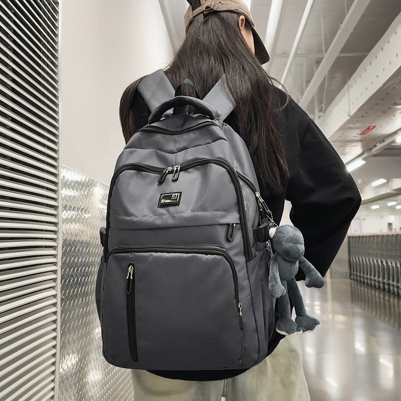 Large-capacity backpacks for male junior and senior high school students, simple travel bags for female college students, lightweight and lightweight backpacks for computers details Picture