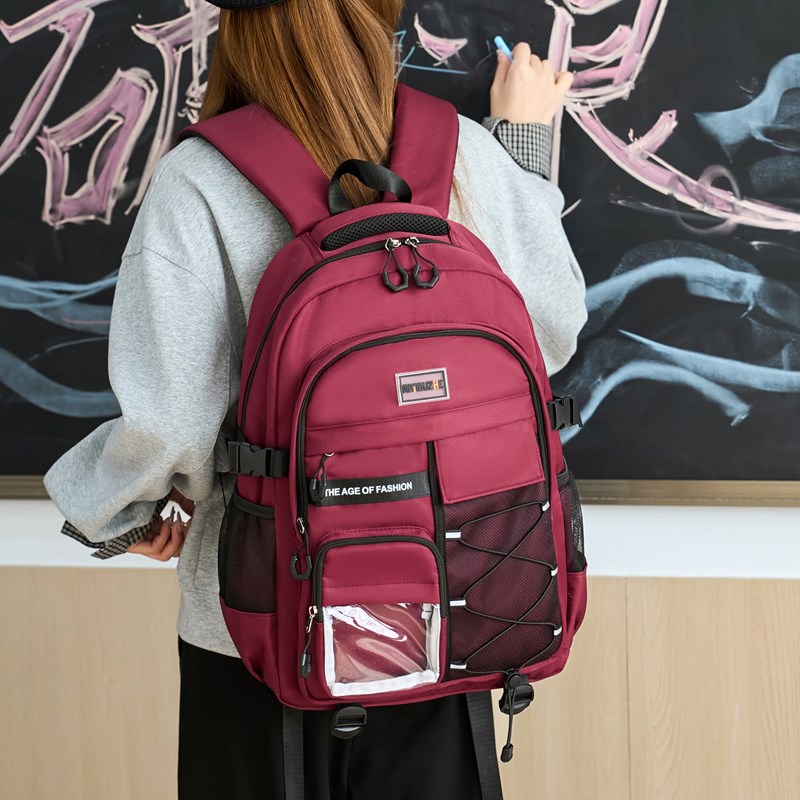 The new large-capacity travel backpack for foreign trade is sturdy and durable. It is a weight-reducing backpack for girls in grades 3 to 5 of primary and secondary schools full figure