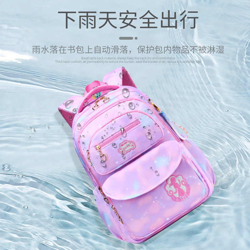 The new 2023 gradient multi-color children's schoolbag with large capacity, reducing burden and protecting the spine, is a backpack for primary school students from grades 1 to 6 details Picture