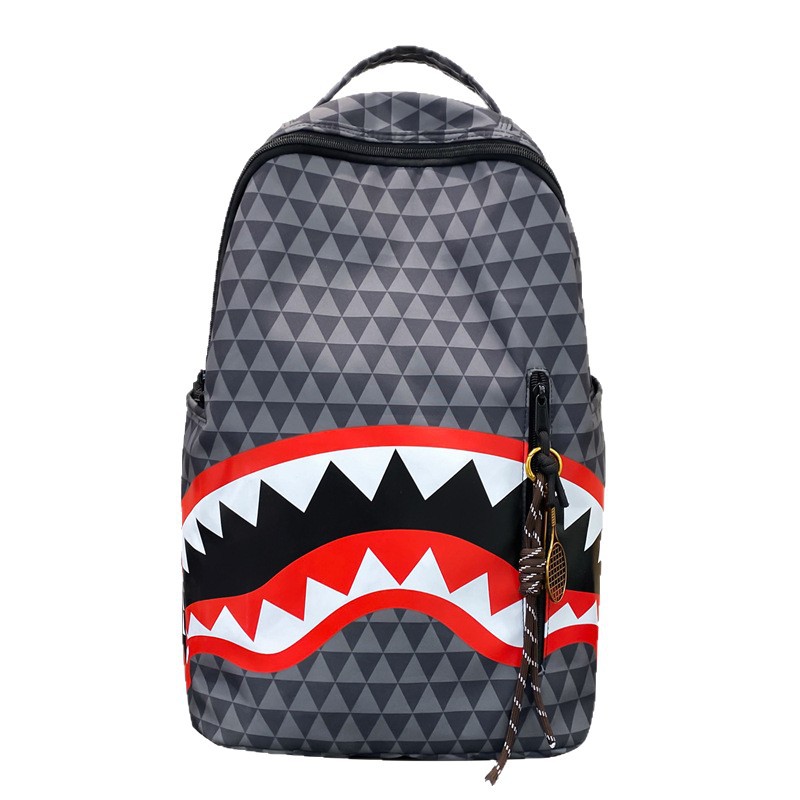 A new high-appearure-level trendy shark graffiti print backpack for junior and senior high school students, a versatile and fashionable backpack for commuting Item Picture