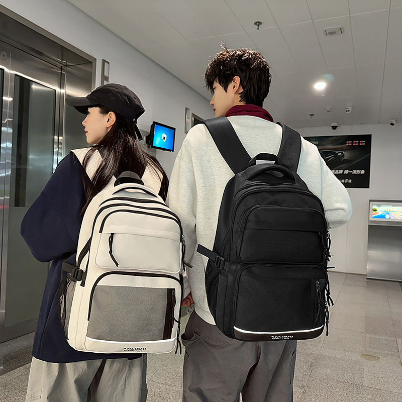 2025 New Korean-style solid-color couple backpack, large-capacity multi-compartment schoolbag, casual, simple and versatile backpack details Picture