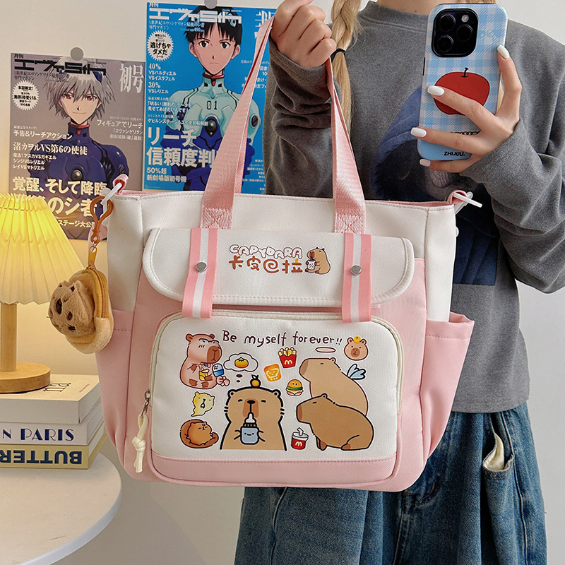 2025 New large-capacity cartoon multi-compartment layer, horizontal appearance, Korean-style commuting, simple after-school bag, lightweight backpack details Picture