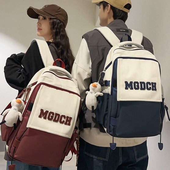 A male student with a high level of appearance, a college student couple, a casual travel backpack with large capacity, a multi-compartment backpack for middle school students, and a female student full figure