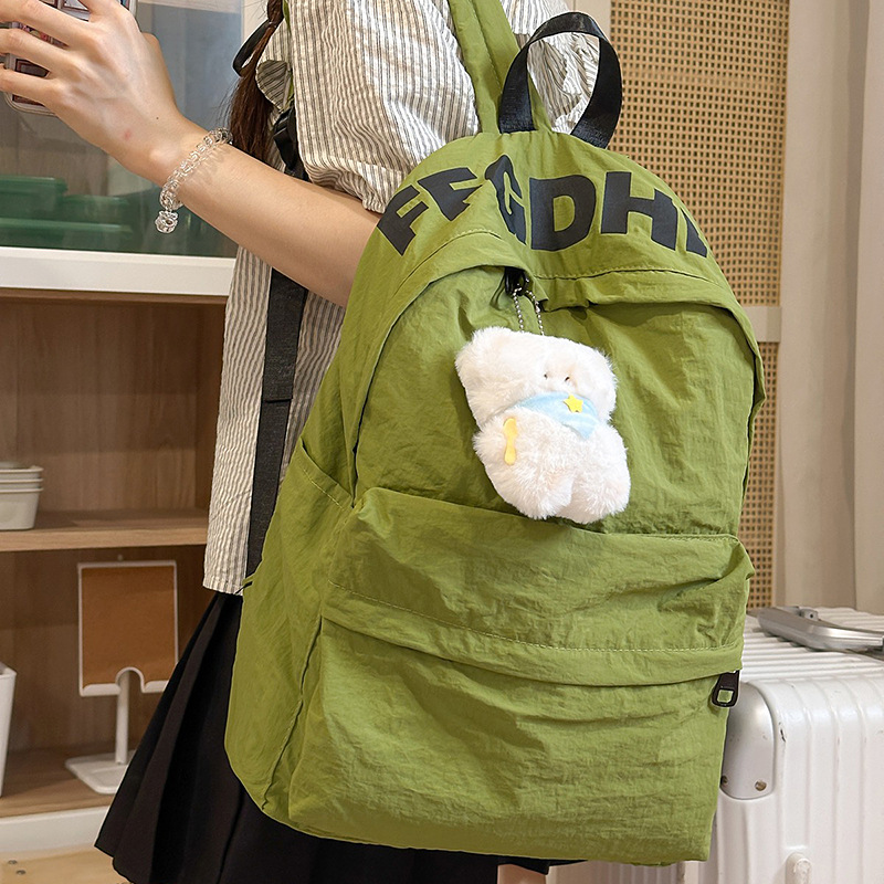 A new Korean-style ins backpack with a high level of appearance, fresh and sweet. It is a lightweight and large-capacity backpack for junior and senior high school students to travel full figure