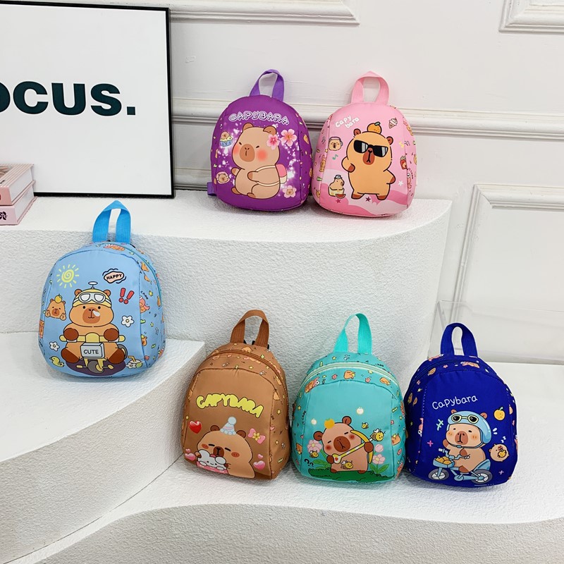 The 2025 summer new cartoon children's bag, cute Kapibara loose change bag for men and women, and outdoor casual backpack full figure