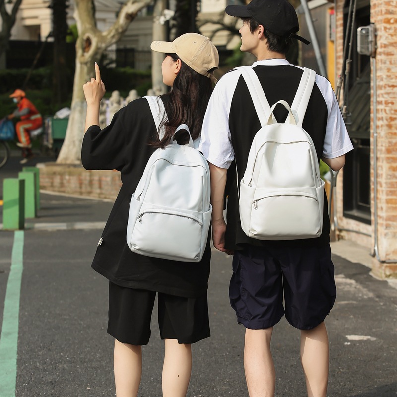 The 2025 new solid-color simple backpack is a versatile, simple, casual and fashionable Korean-style commuting backpack for college students details Picture