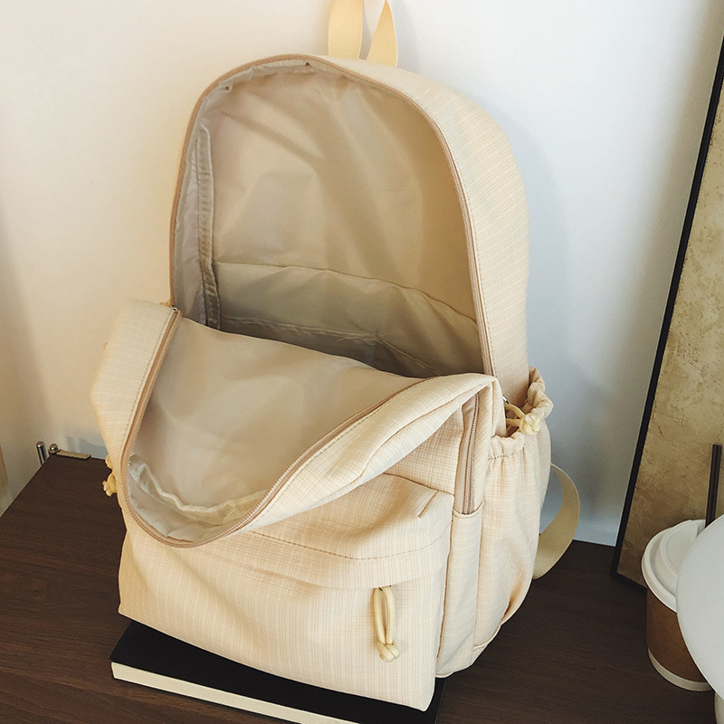 2025 New college-style schoolbag, a large-capacity backpack for junior high school girls, and a simple casual backpack for high school and college students Application Scenario