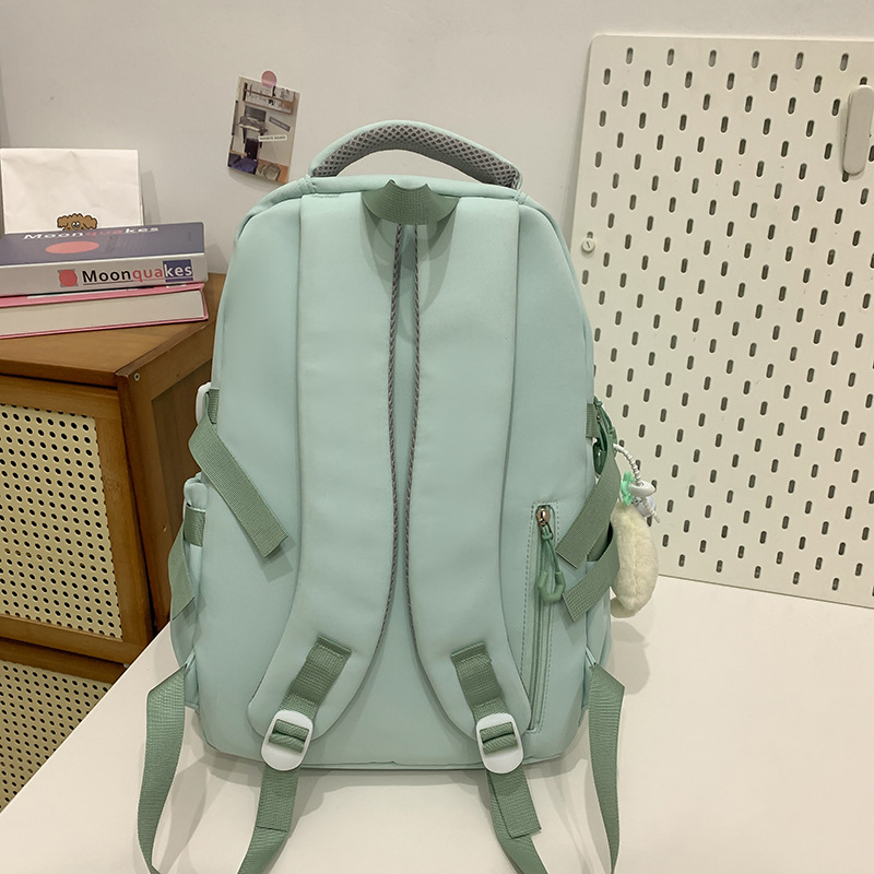 A new solid-color large-capacity backpack with a Japanese ins school style, versatile for junior high school students and featuring multiple compartments to reduce the load Specification drawing
