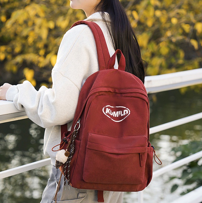 American retro schoolbag for female college students, Korean style Instagram large-capacity backpack for couples, simple travel lightweight backpack full figure