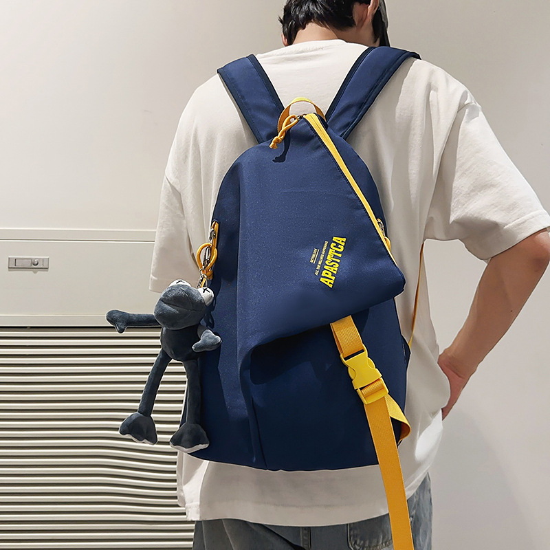 New high-appearance-level color-blocking trendy schoolbag for couples, casual, simple, lightweight, outdoor versatile, large-capacity backpack details Picture
