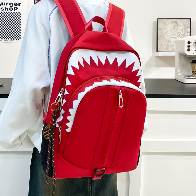 The new shark glow-in-the-dark and funny backpack is fashionable and versatile. It is a large-capacity, trendy and cool travel and casual backpack for students full figure