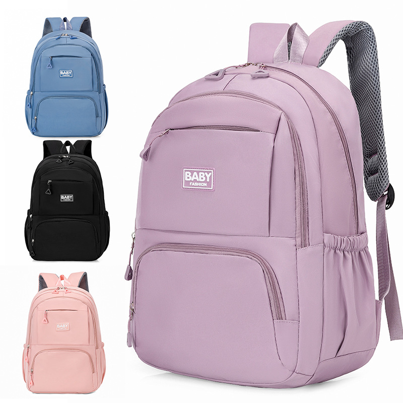 2025 New large-capacity student schoolbag, simple computer bag for both boys and girls, nylon backpack for junior high school students full figure