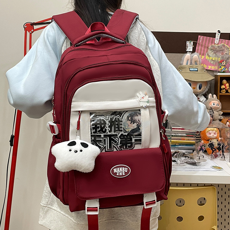 A new Japanese-style ins high-appearance-level fresh and sweet "smug pain bag" for girls, a lightweight and large-capacity backpack for junior and senior high school students full figure