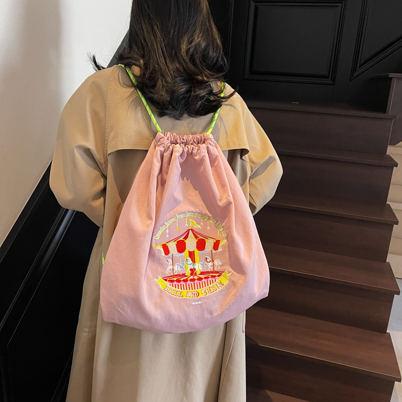 A new Japanese-style trendy fashion backpack, cute cartoon, eco-friendly, drawstring, large-capacity embroidered casual student bag full figure