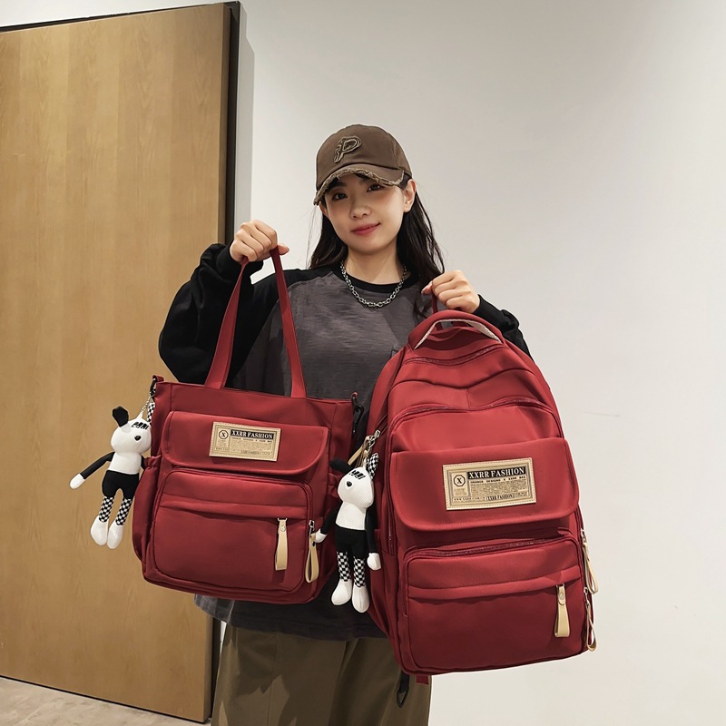 New two-piece schoolbag set: A large-capacity backpack for girls, a simple and lightweight backpack for junior and senior high school students, and a supplementary bag for primary school students full figure