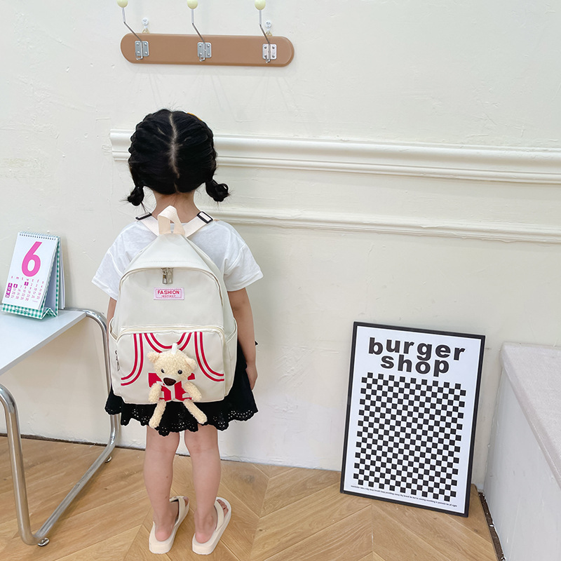 Kindergarten children's cartoon backpacks, girls' and boys' baby team uniforms, bear double-shoulder schoolbags details Picture