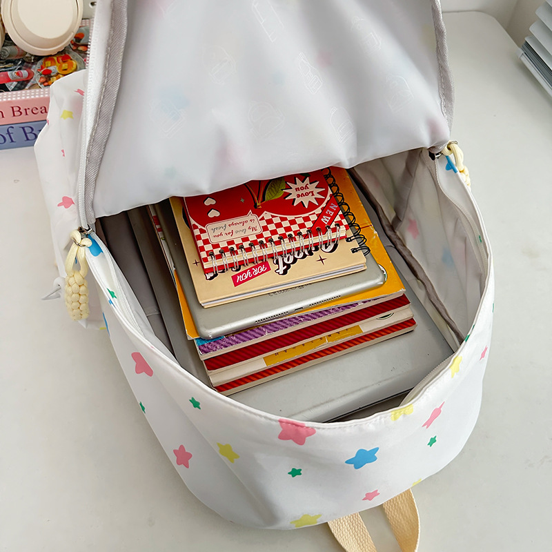 A new high-appearance-level, fresh and sweet, colorful star-shaped backpack from Japanese Instagram, a large-capacity backpack for junior and senior high school students Application Scenario