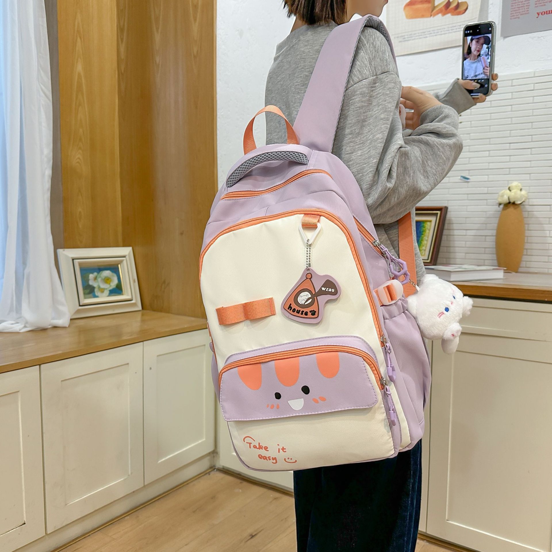 New schoolbag for primary school students in grades 2 to 5, high appearance level, color-blocking lightweight backpack, campus style student backpack details Picture