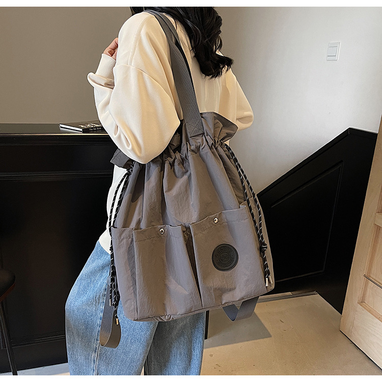 New 2025 lightweight backpack for women, drawstring pocket travel bag, college student schoolbag, casual and trendy backpack details Picture