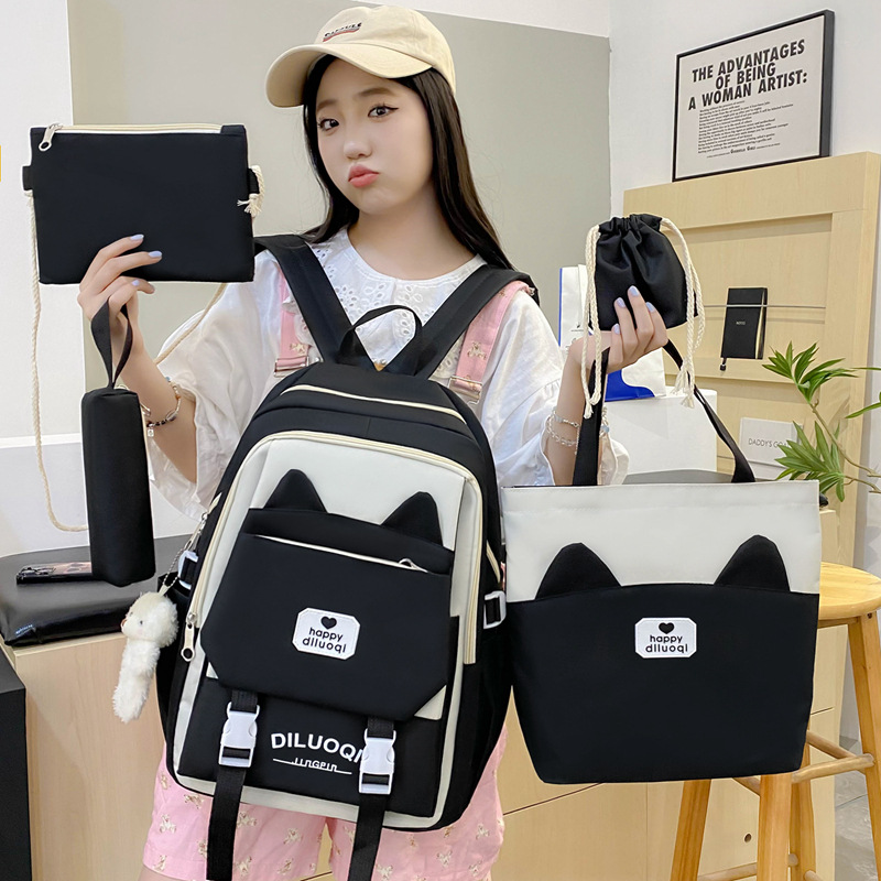 "Schoolbag Girl bags: A new Korean-style cute backpack for primary school students, a large-capacity school backpack set of five pieces. full figure