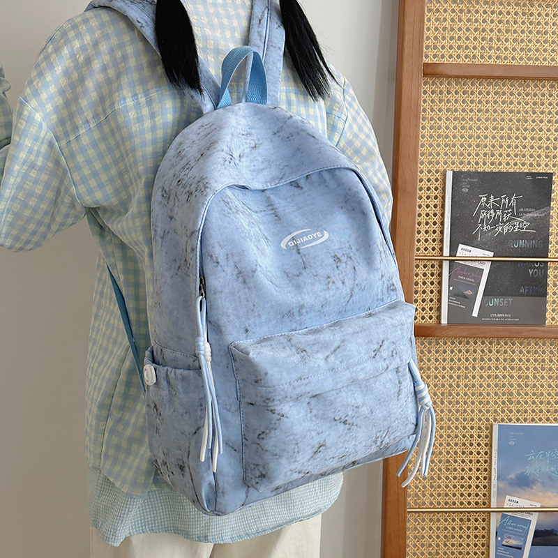 Simple tie-dyed schoolbag for college students, niche and versatile backpack, large-capacity Japanese-style backpack, casual travel single-shoulder bag full figure