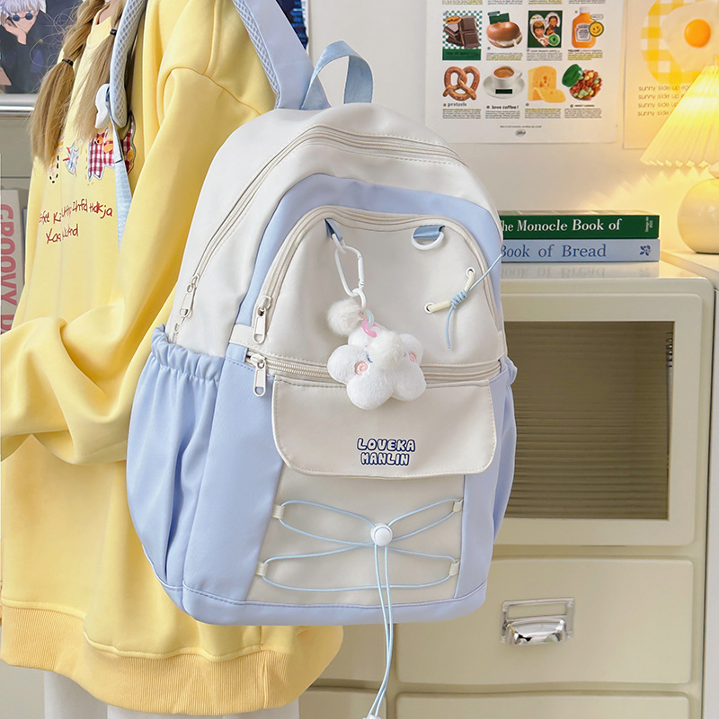 A fresh and clean schoolbag for girls with a high level of appearance, an ins style backpack for going out and traveling, a sweet and cool backpack that is versatile for female college students full figure