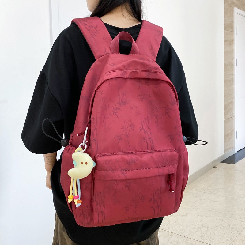 A new high-appeal solid-color bamboo print backpack from Korean Instagram, a couple's lightweight travel backpack with large capacity details Picture