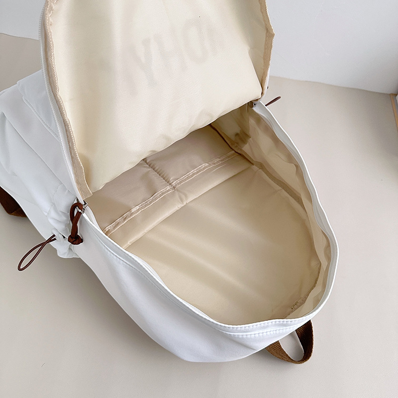 American retro college student schoolbag, fashionable large-capacity travel bag, simple and versatile backpack, solid color letter backpack Application Scenario