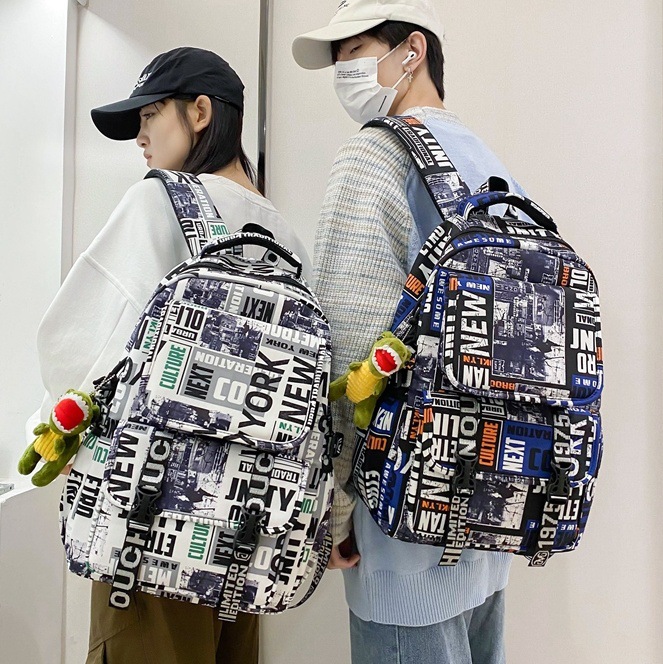 "Men's 2025 New style personalized graffiti middle school backpack, Japanese trendy brand college student couple travel backpack. full figure