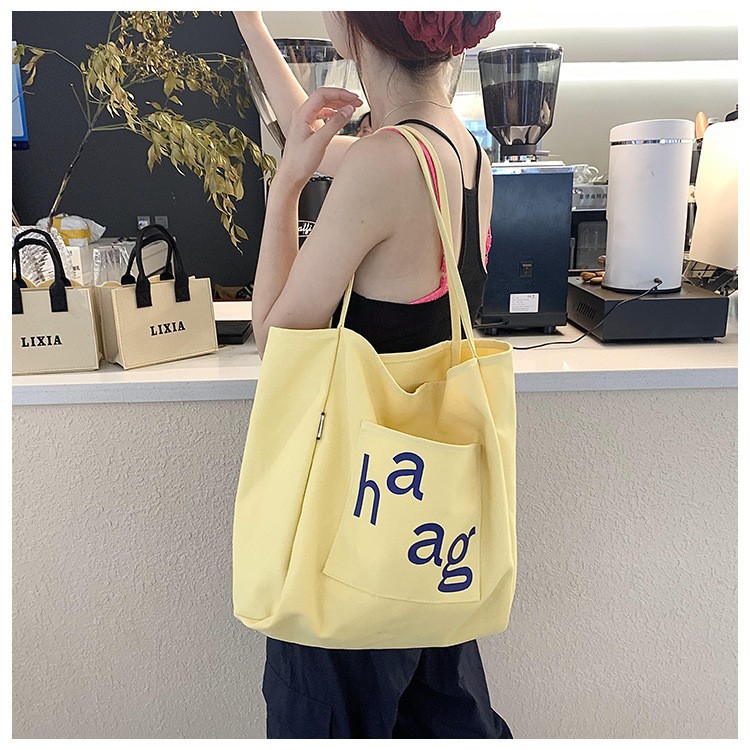 Large-capacity canvas bag for women, new 2024 trendy summer, Korean-style laid-back single-shoulder bag, student commuting tote bag details Picture