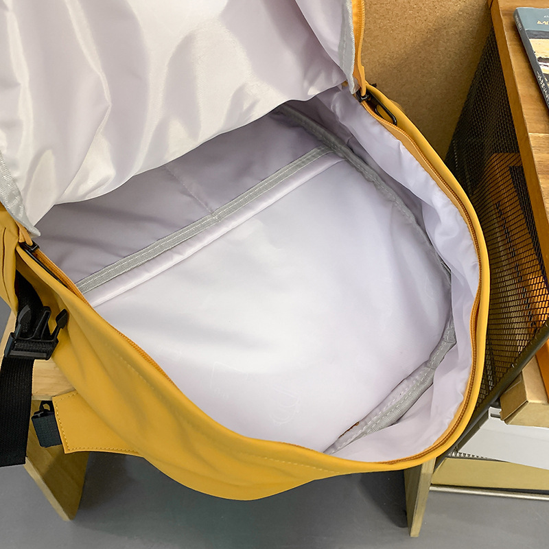 The 2025 new large-capacity simple backpack has a high appearance level. It is suitable for both boys and girls and is a solid color schoolbag for junior and senior high school students Application Scenario