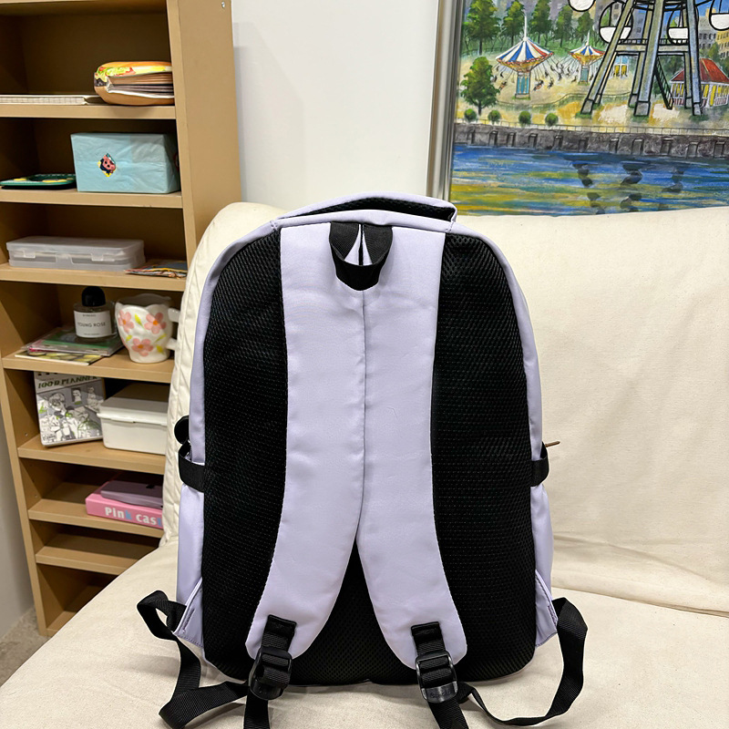 A new Japanese-style backpack with a high aesthetic level, fresh and sweet candy color, is simple, lightweight and has a large capacity for junior and senior high school students Specification drawing
