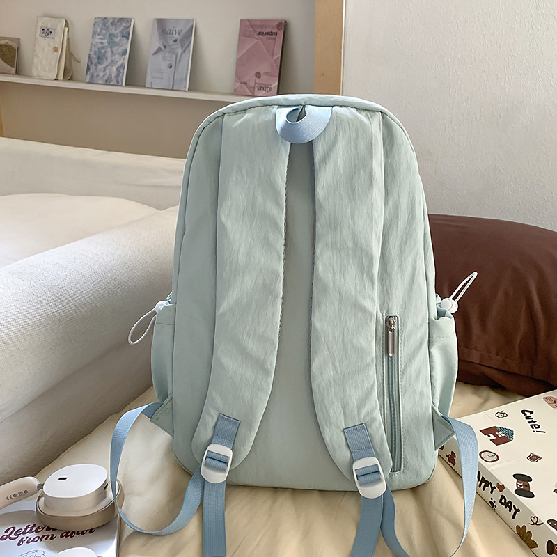 A new high-appearure-level Japanese ins fresh, sweet and cute backpack for student girls in solid color with drawstring and large capacity Specification drawing