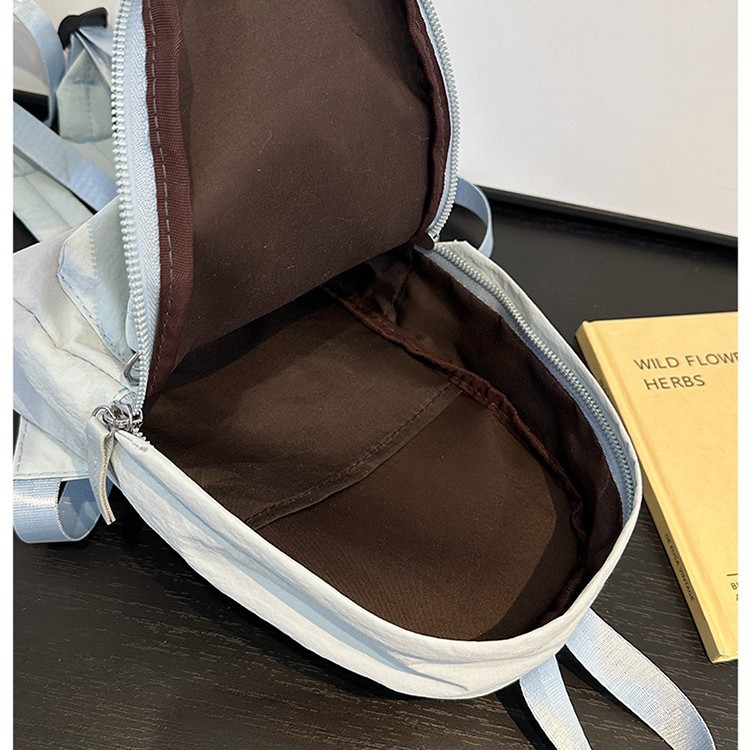 This is a new cute mini backpack for summer, featuring a laid-back style and a simple, casual Korean-style Instagram blue travel bag Application Scenario