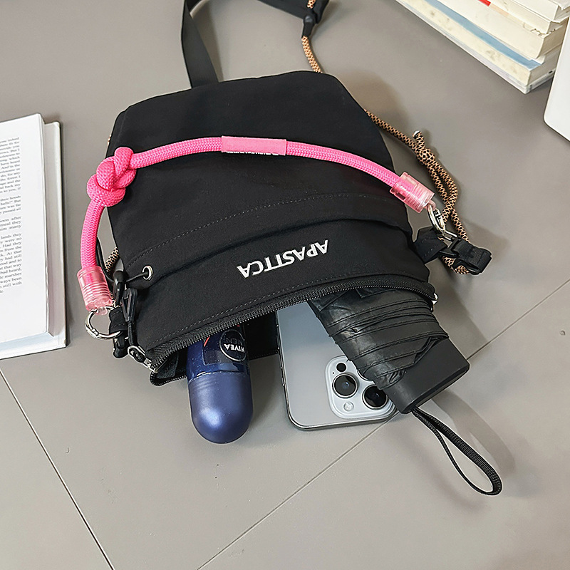 A new high-appearure-level forest-themed outdoor lightweight travel crossbody bag for men and women, a versatile crossbody bag for dancing, hiking and camping Application Scenario