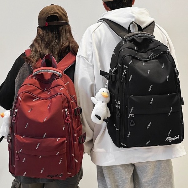 A girl with a schoolbag on Instagram, a cool and trendy college student's personality, a letter backpack with a high level of appearance, a multi-layered backpack for primary and secondary school students, and a boy full figure