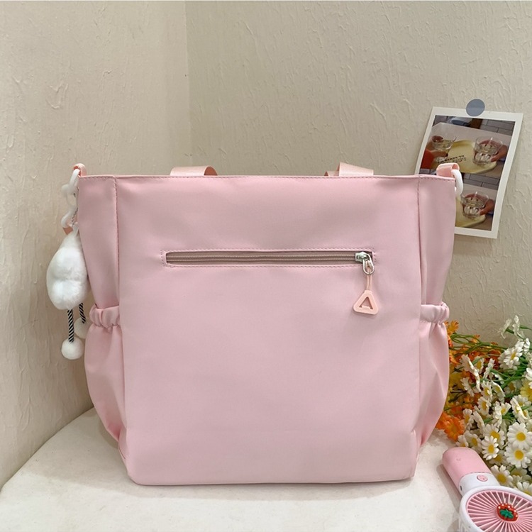 This is a fresh and cute backpack for children and primary school students in grades 3 to 6. It has a sweet style and a solid color with a transparent layer Specification drawing