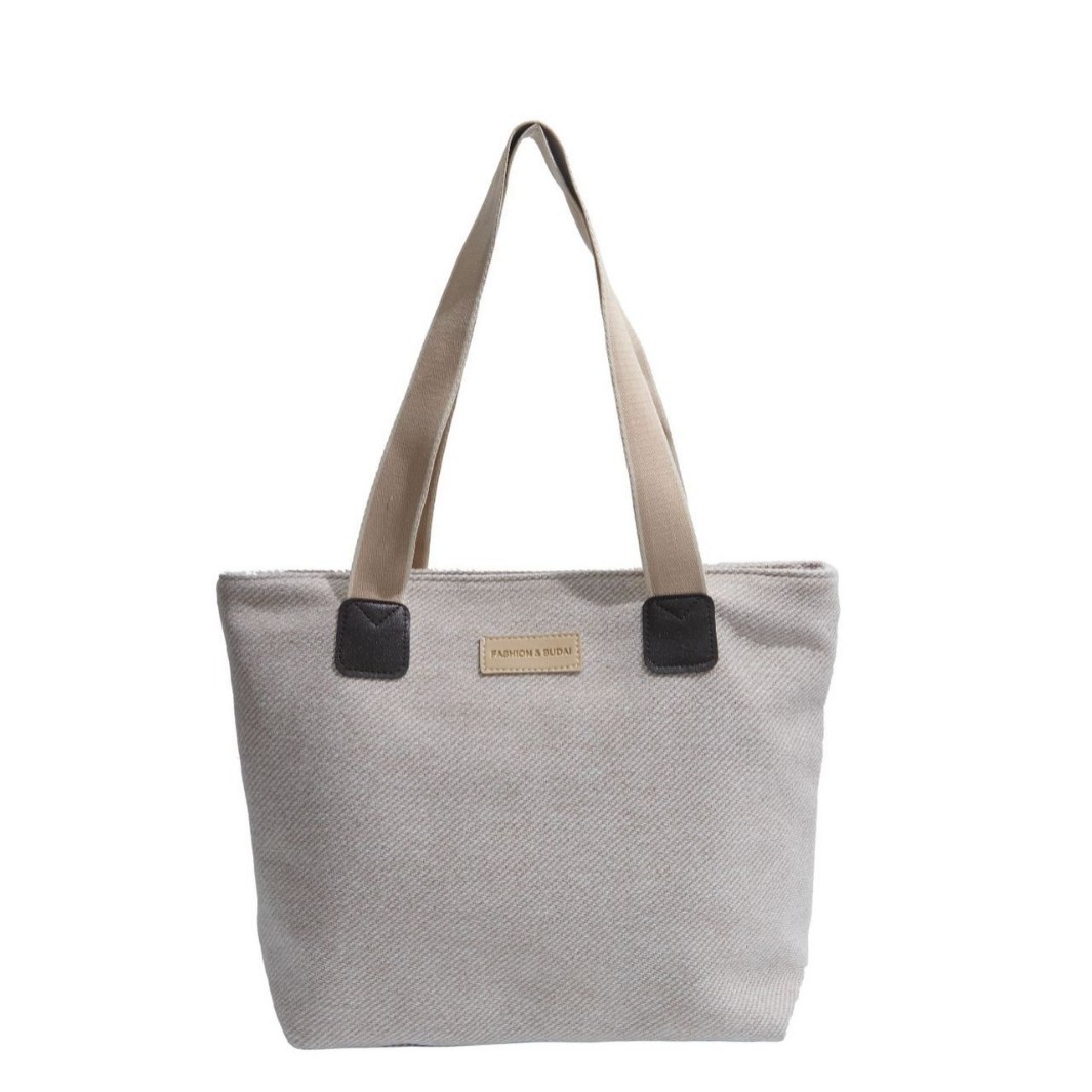 The new autumn and winter tote bag is a versatile, fashionable and casual handbag with a large capacity and a laid-back Korean-style single-shoulder bag for women Item Picture